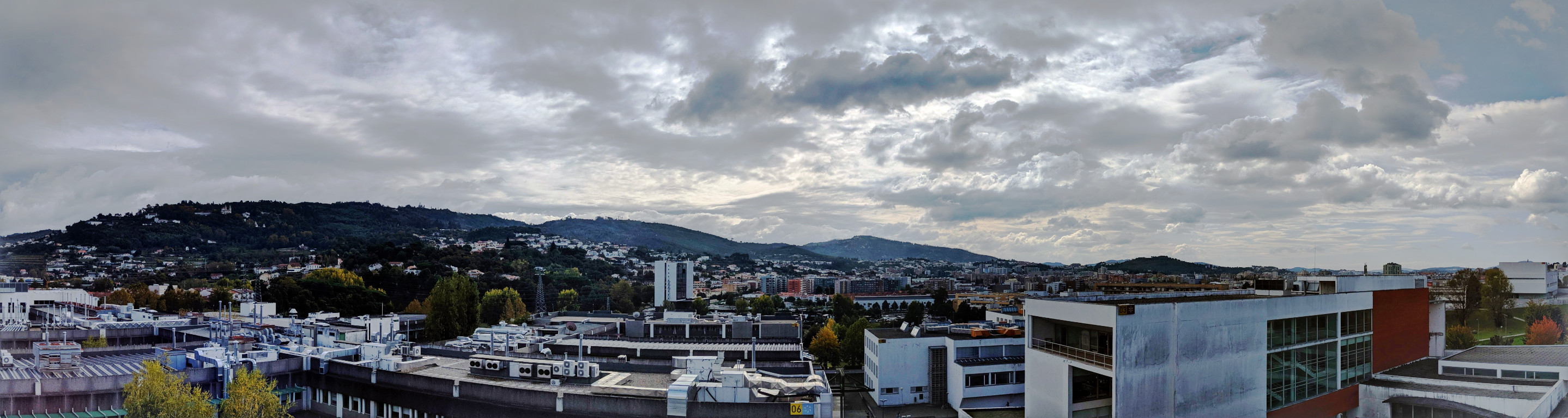 Clouds over mountains, from the penthouse lounge of Building 07.